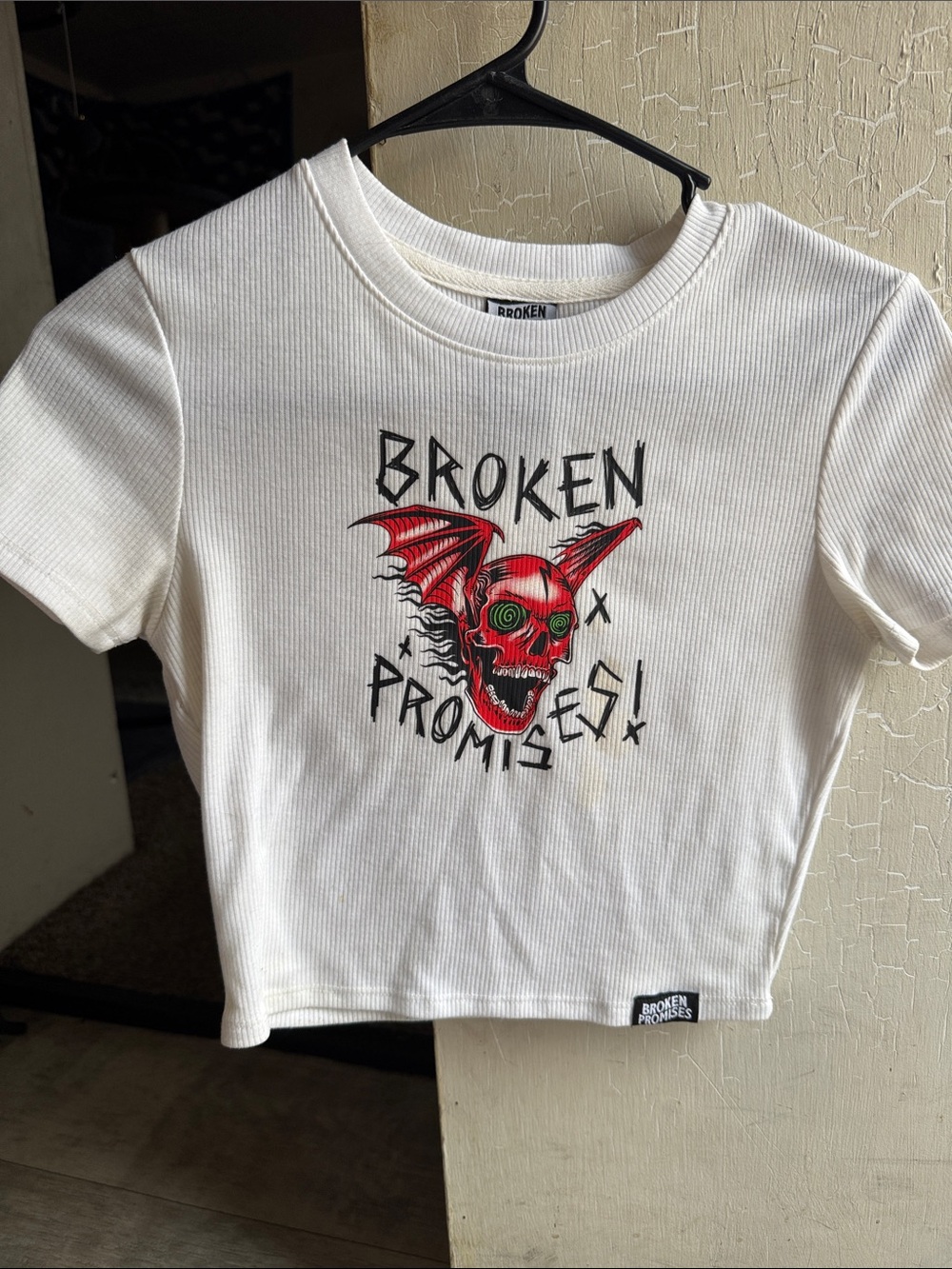 Broken Promises White Ribbed Crop Top with Red Skull Graphic
